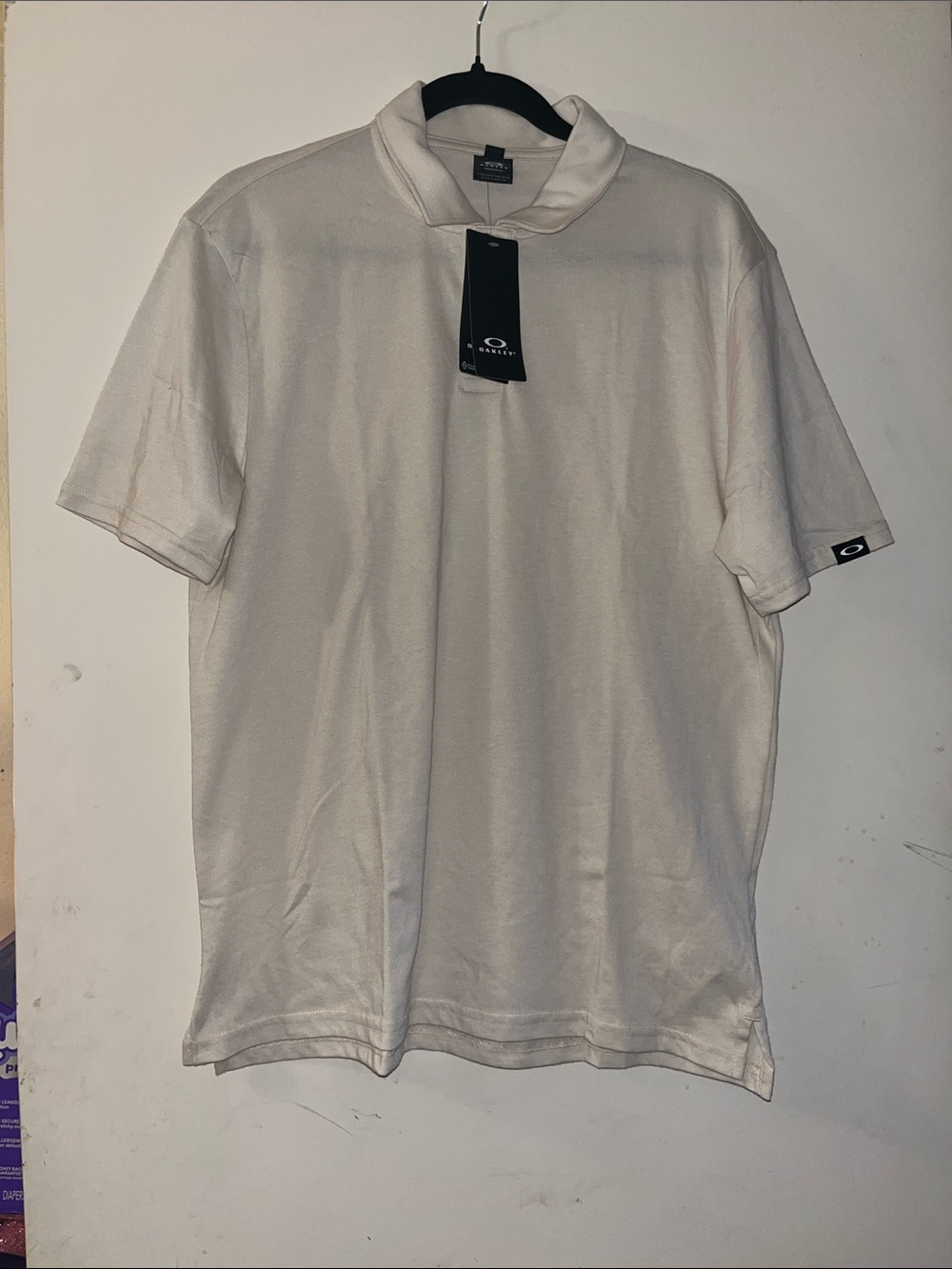 Oakley Men's Cream/Off-White Polo Shirt with Logo Tag
